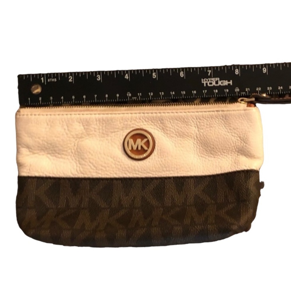 Michael Kors leather make up bag or wristlet W/strap has pockets for cards
